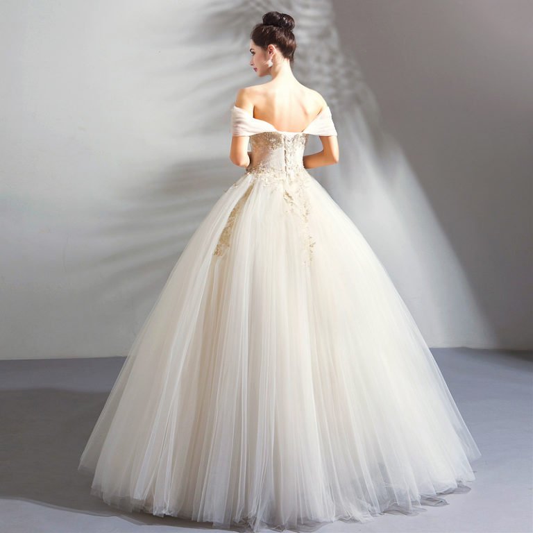 white gown with gold