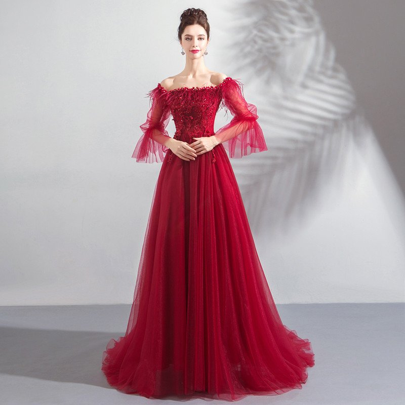 red evening gown with sleeves