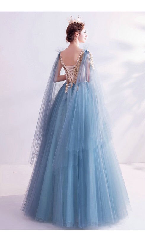golden and blue gown